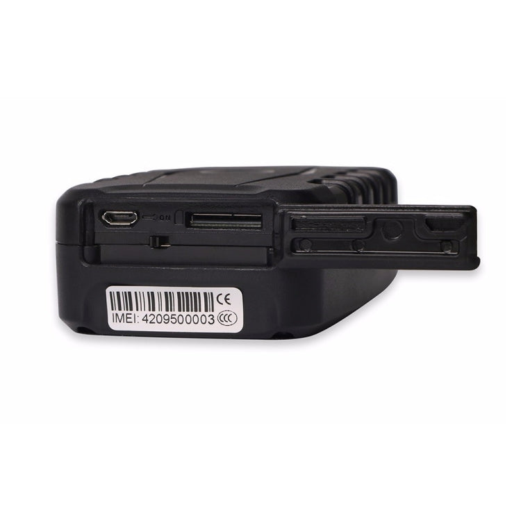 Black GPS tracker with visible ports and compliance label on the back