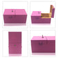 Pink wooden anti-stress box toy shown open with interior and metal latch knob.