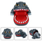 Gray dinosaur bite toy shown front, side, and top views with red mouth base