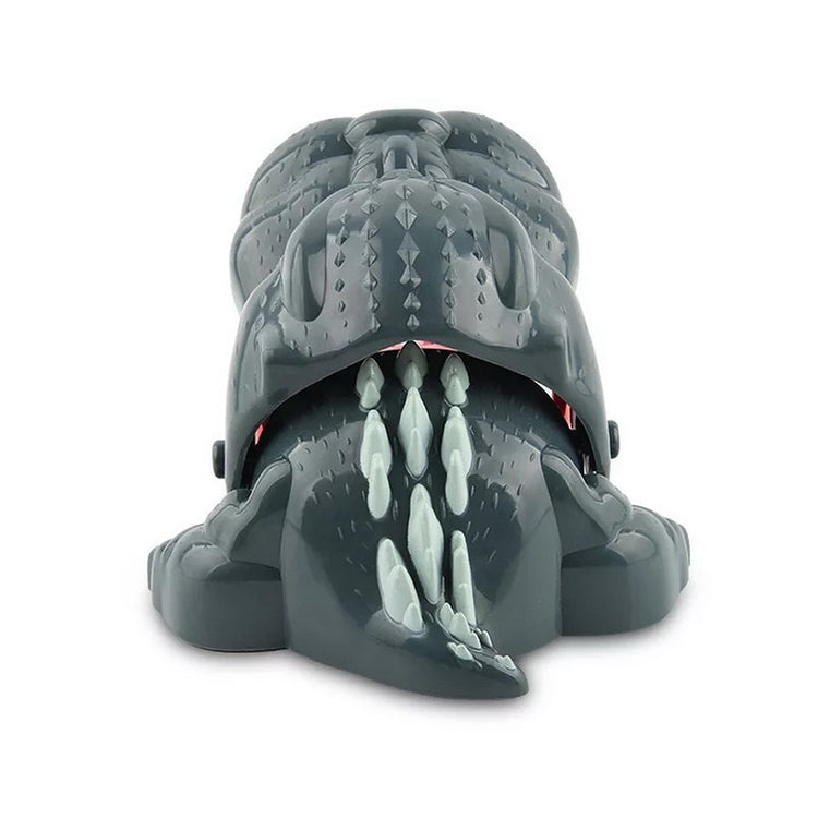 Gray dinosaur bite toy with open mouth showing red interior and white fangs