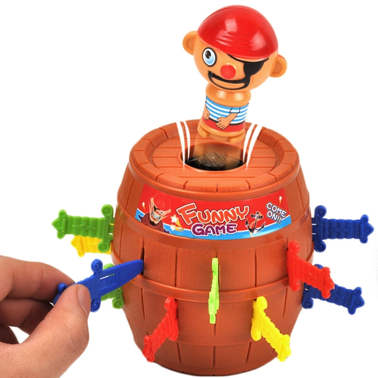Pirate barrel game toy with red-capped figure and removable multicolor swords