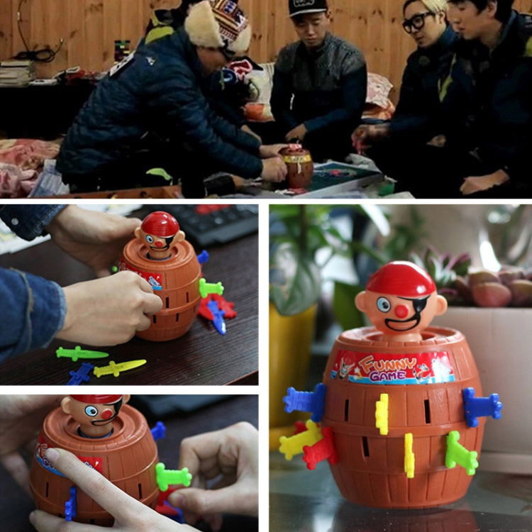 Pirate barrel game toy held on table with multicolor sword pieces and red-capped figure