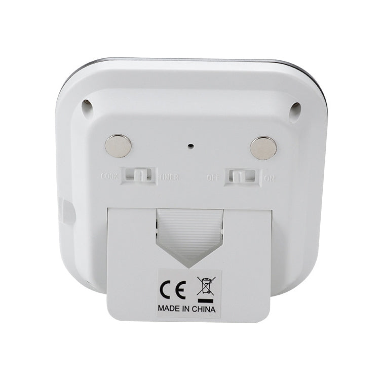 Digital thermometer back panel with battery compartment cover and connection ports