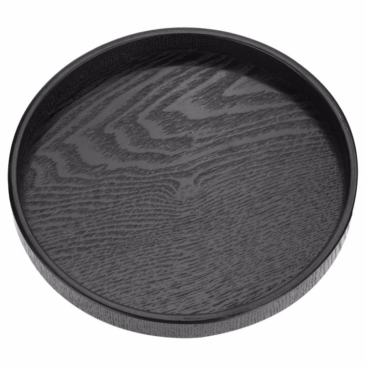 Black round solid wood tea tray with raised rim and visible woodgrain texture, 30cm