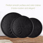 Three black round wood trays stacked, dark woodgrain finish on smooth raised surfaces
