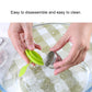 Green silicone leaf tea bag strainer holder with stainless basket during cleaning