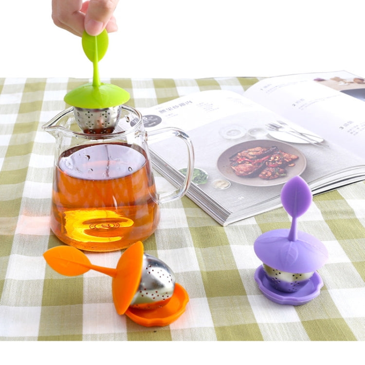 Green and purple silicone hanging tea bag strainers with stainless perforated baskets