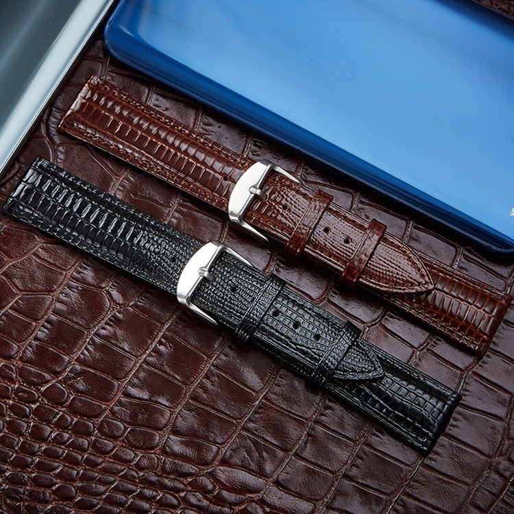 Lizard-texture leather watch bands in coffee brown and black with silver buckles.