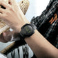 SKMEI 1301 sports smartwatch on wrist with black strap and green digital LCD