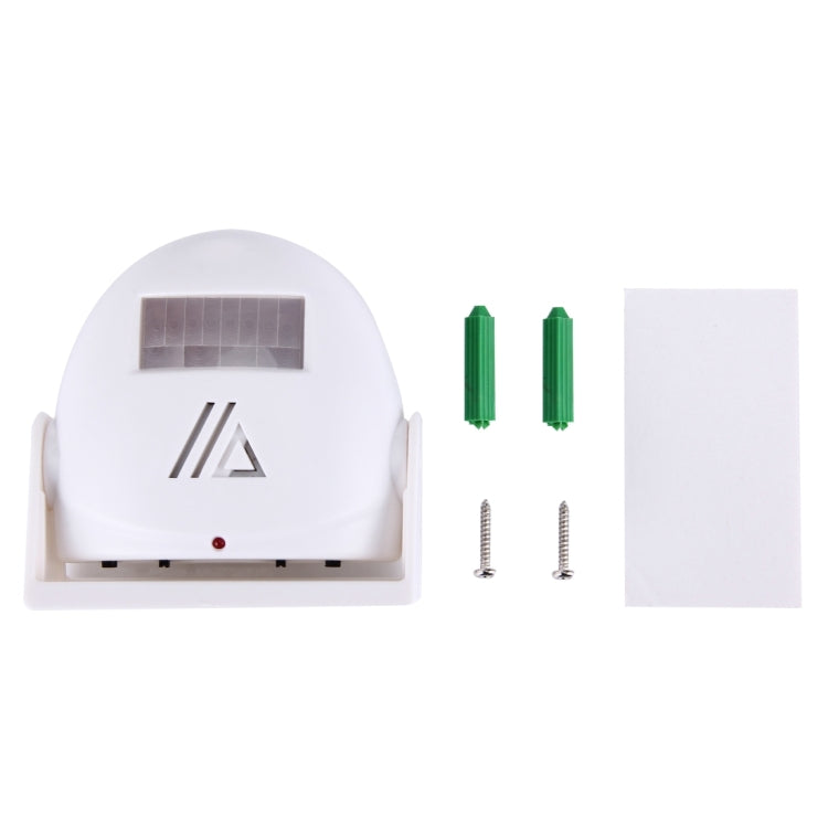White wireless infrared doorbell kit with mounting screws and green battery inserts