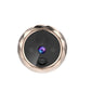 Gold cat-eye camera doorbell module with circular lens and call button