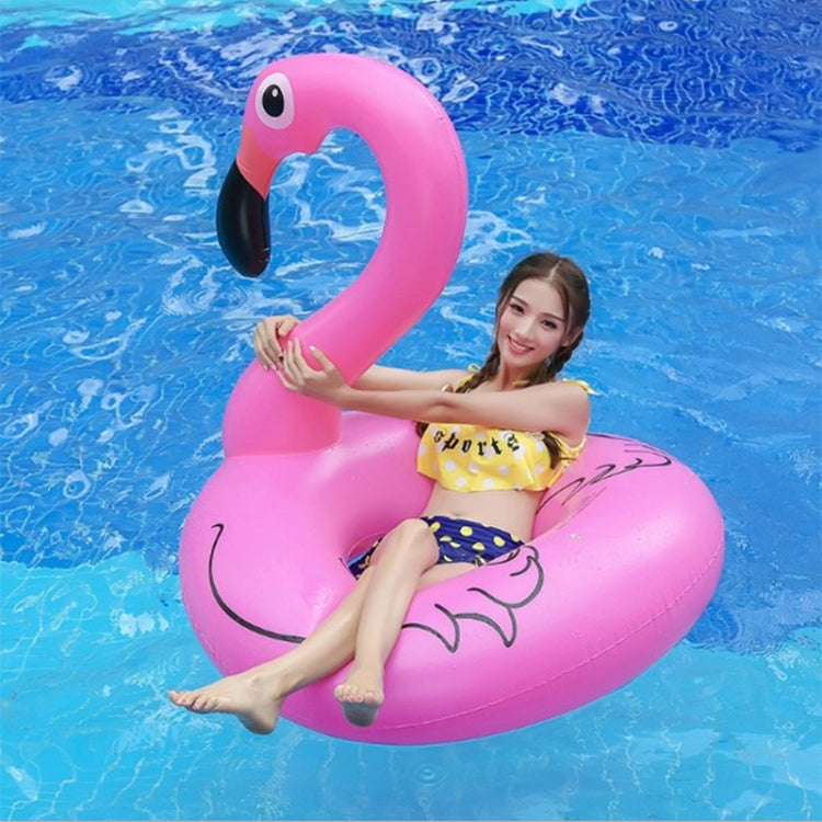Pink flamingo inflatable pool float lounge ring, 120 cm, with face above water