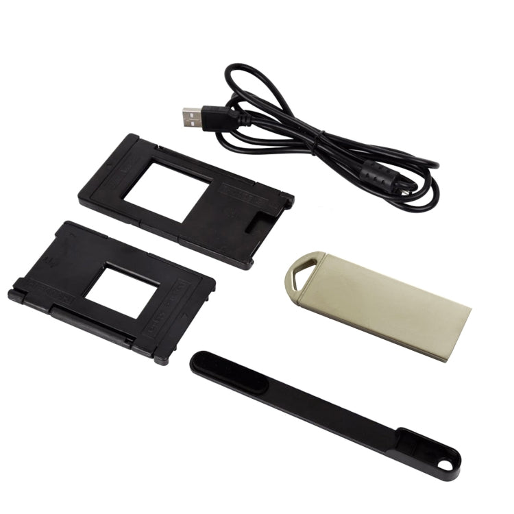 Film scanner accessory kit with USB cable, film holders, and cleaning cloth