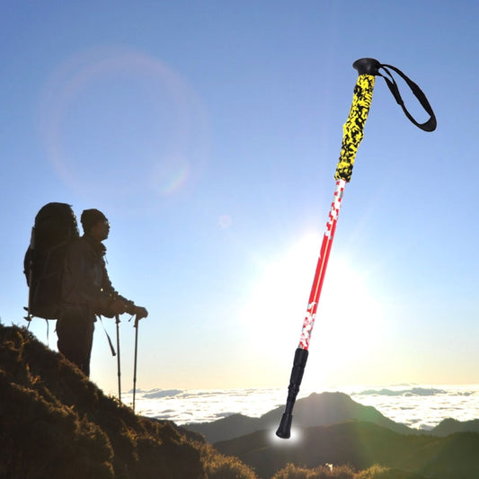 135cm adjustable trekking pole with red-and-white shaft, yellow grip, and black wrist strap