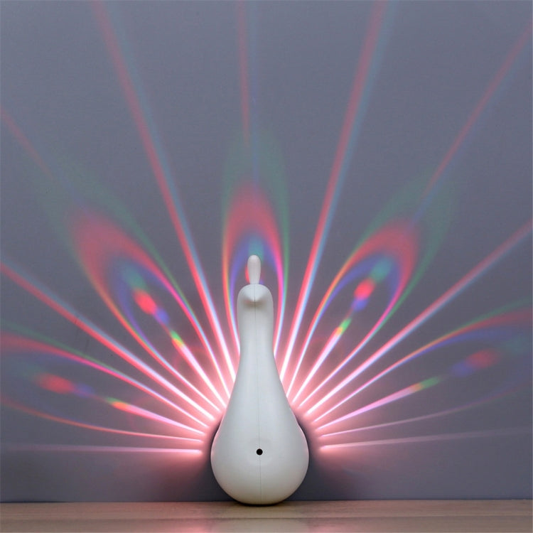 Peacock-shaped LED night light, white teardrop body with small tail