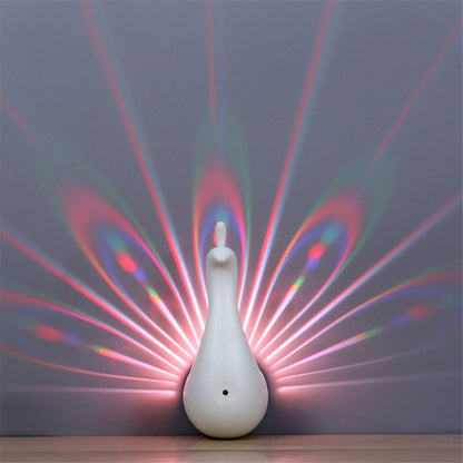 Peacock-shaped LED night light, white teardrop body with small tail