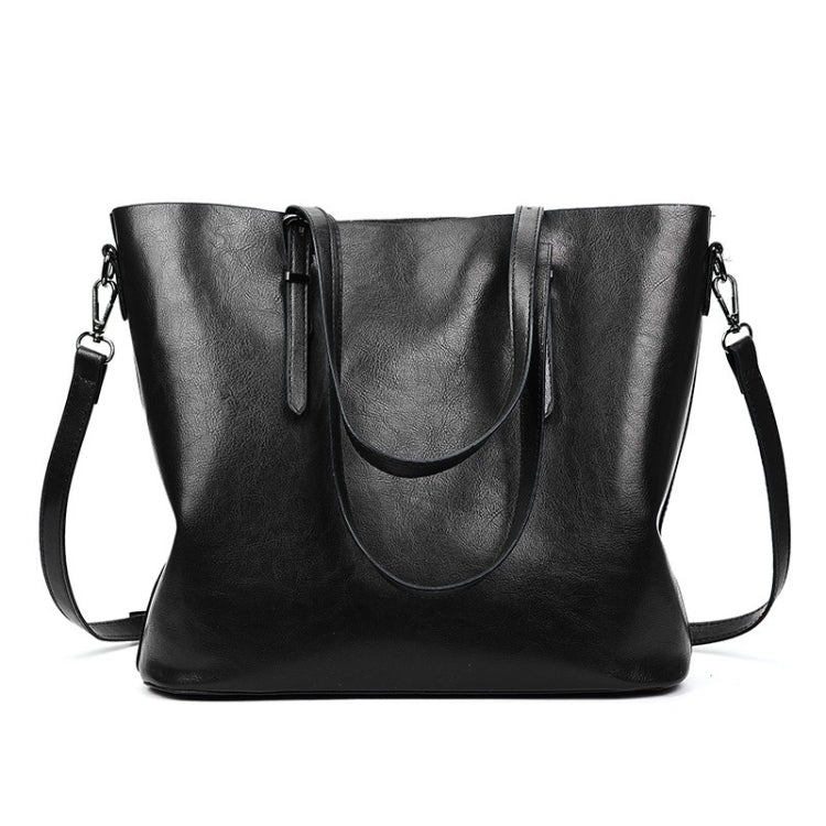 Black PU shoulder tote with dual top handles and adjustable crossbody strap