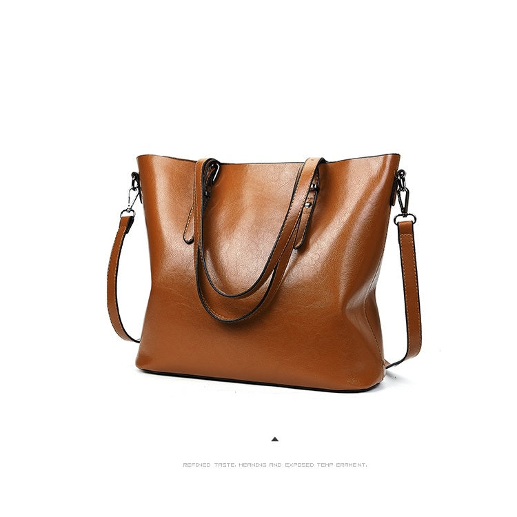 Brown PU shoulder tote with two handles and side crossbody strap