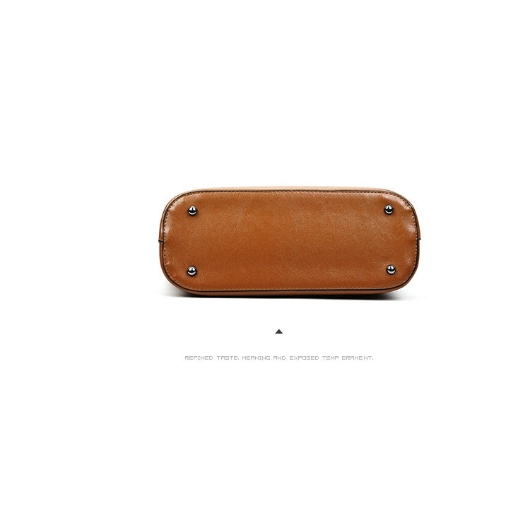 Brown PU shoulder bag front panel with metal rivets and rounded rectangular shape