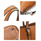 Brown PU shoulder bag details: stitched edges, metal clip, and strap hardware