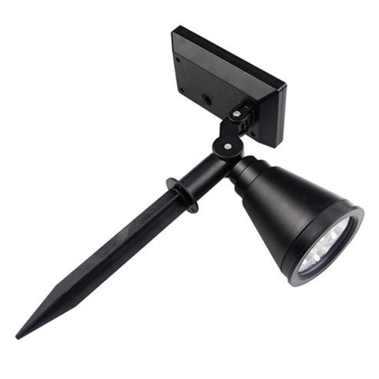 Black solar spotlight with adjustable bracket and ribbed lens housing on spike stand
