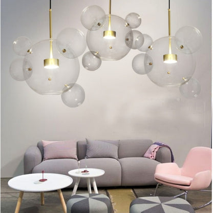 Glass ball chandelier with clear globe spheres and gold stems, 3 hanging lights