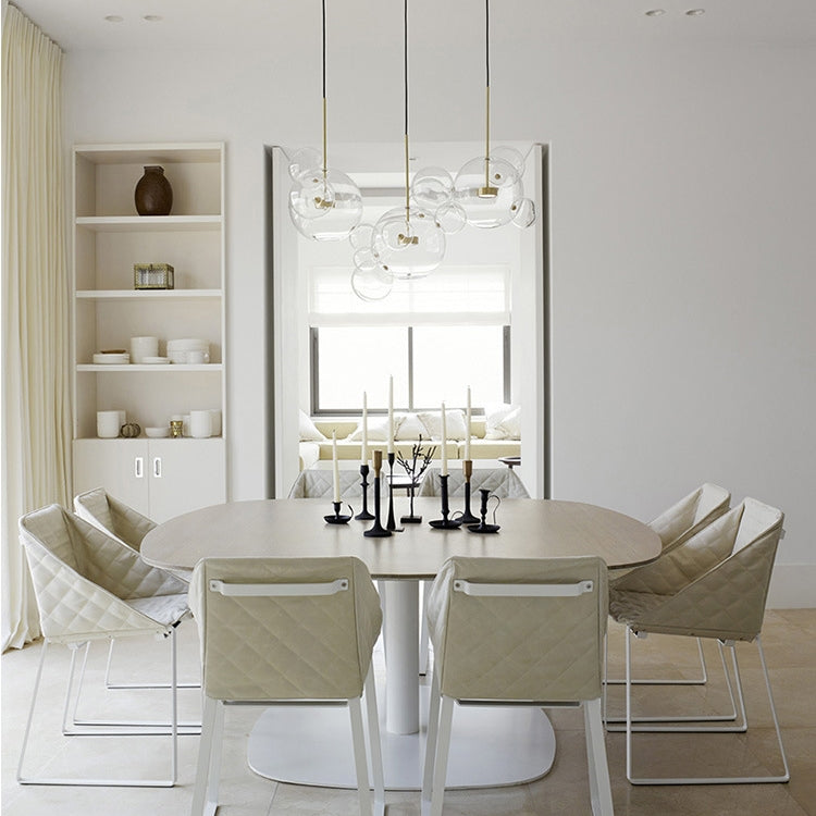 Clear glass ball chandelier with gold stems and multiple globe shades