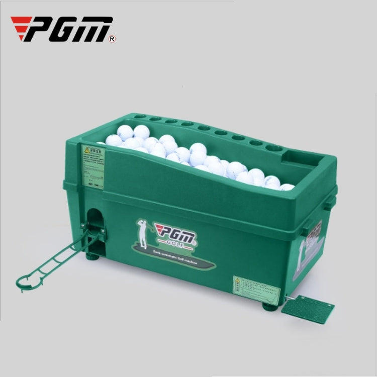 Green indoor golf ball machine with open top tray and white balls, front view