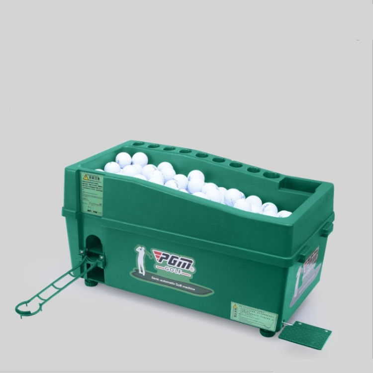 Green indoor golf ball machine showing open tray of white balls, front-left angle