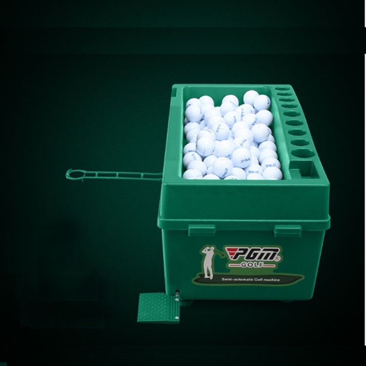 Green automatic golf ball machine with open tray filled with white balls, front view