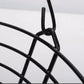 Close-up of black wire basket frame and metal ring connection