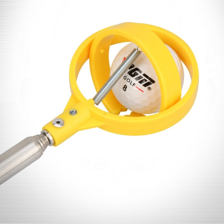 Yellow golf ball catcher with spring mechanism and golf ball inside the hoop