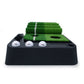 3m indoor putting trainer with stacked green turf rolls on black base