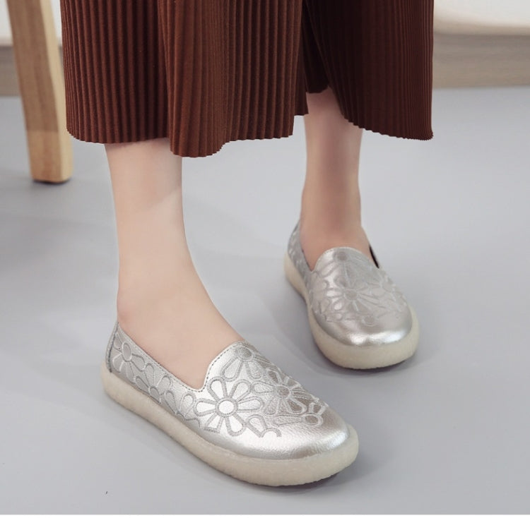 Women's white embroidered slip-on shoes with flower pattern on upper, rounded toe