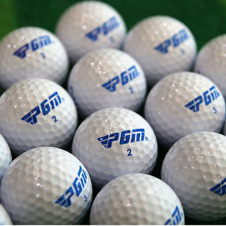 Pack of white PGM golf balls with blue branding and “2” numbers