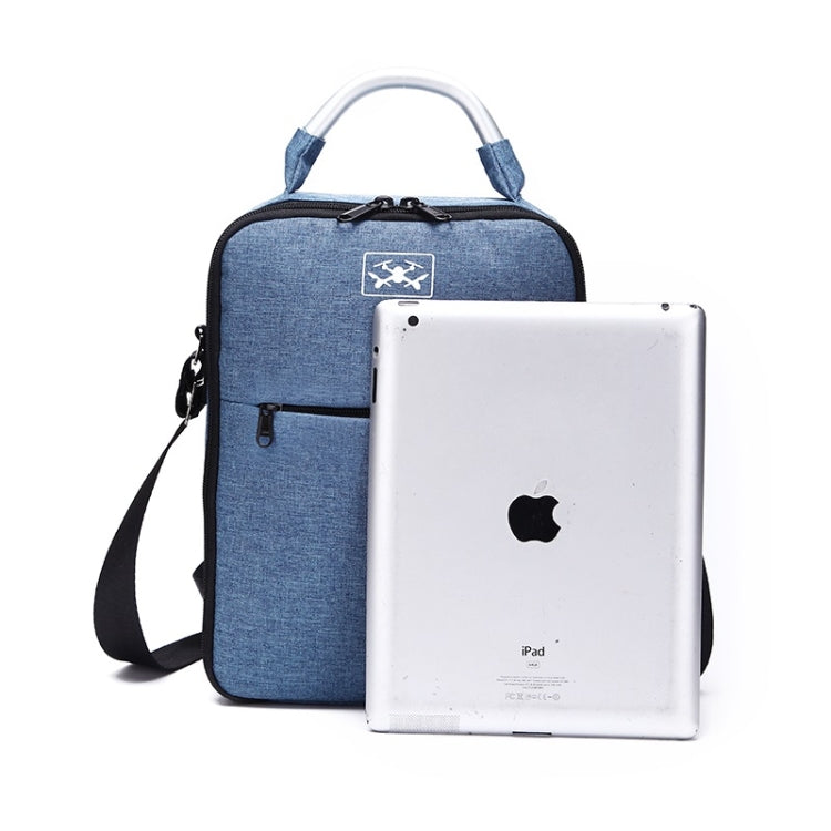 Blue fabric shoulder case bag holding an iPad tablet with front zipper pocket and handle.