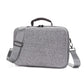 Gray padded shoulder carry case with adjustable strap and side zipper pockets.