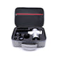 Open gray case with black interior foam cutouts for device and massage attachments.