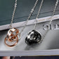 Couple necklace set with black and rose gold interlocking ring pendants and silver chains