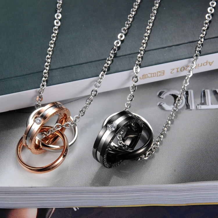 Couple necklace set with black and rose gold interlocking ring pendants and silver chains