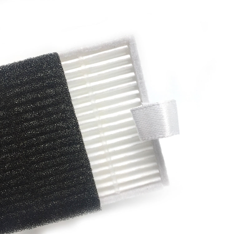 Black foam filter with white ridged insert and fabric tab