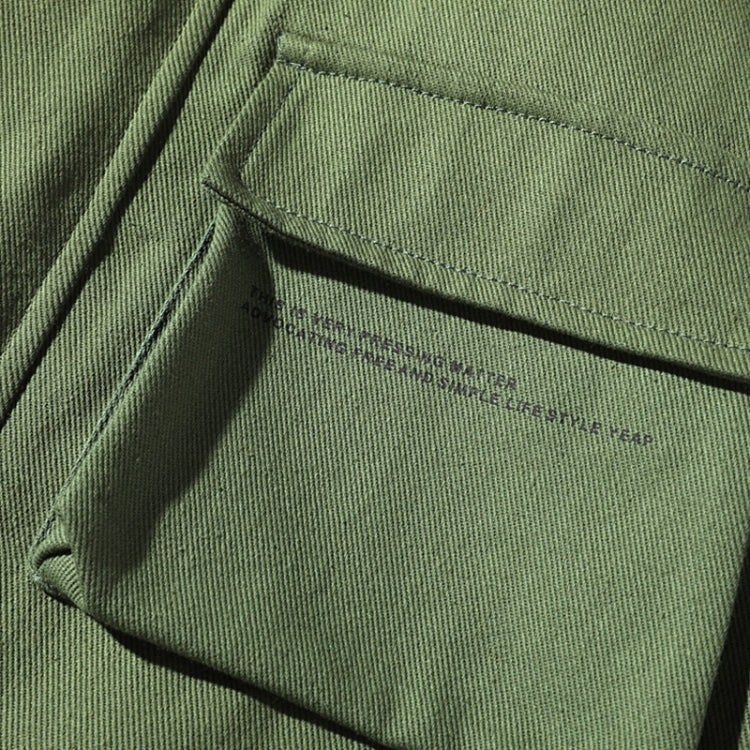 Green inner pocket with fabric label detail on jacket lining