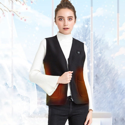 Black heated sleeveless vest with front zipper and two pockets, worn by model