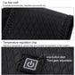 Black quilted heated vest detail with zipper and one-button control icon