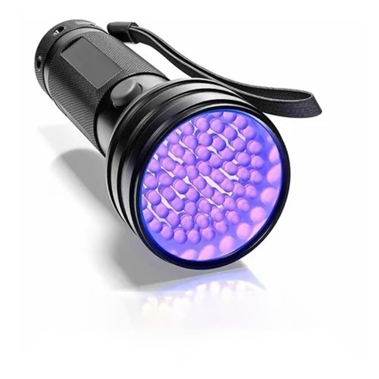 Black UV flashlight with glowing purple circular head and carry strap