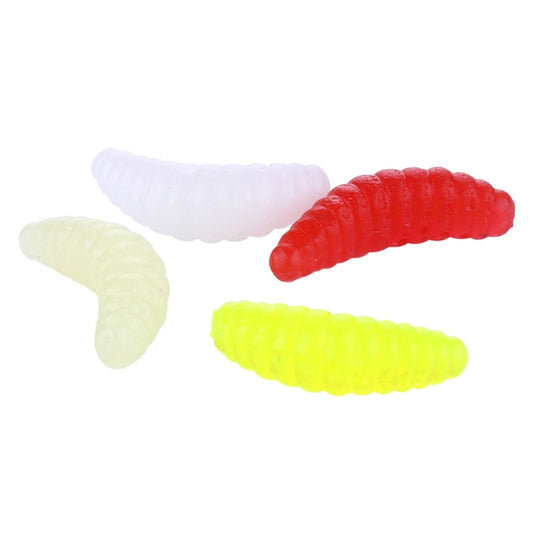 Assorted soft bait worms: white, pale yellow, and red curled crescent shapes